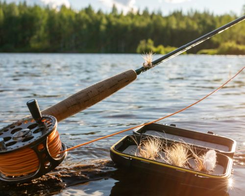 A,Fly,Fishing,Rod,And,An,Open,Fly,Fishing,Box
